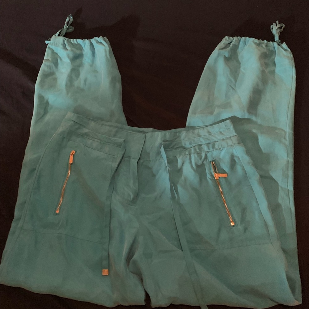lightweight blue shorts zipper pockets tie leg ends